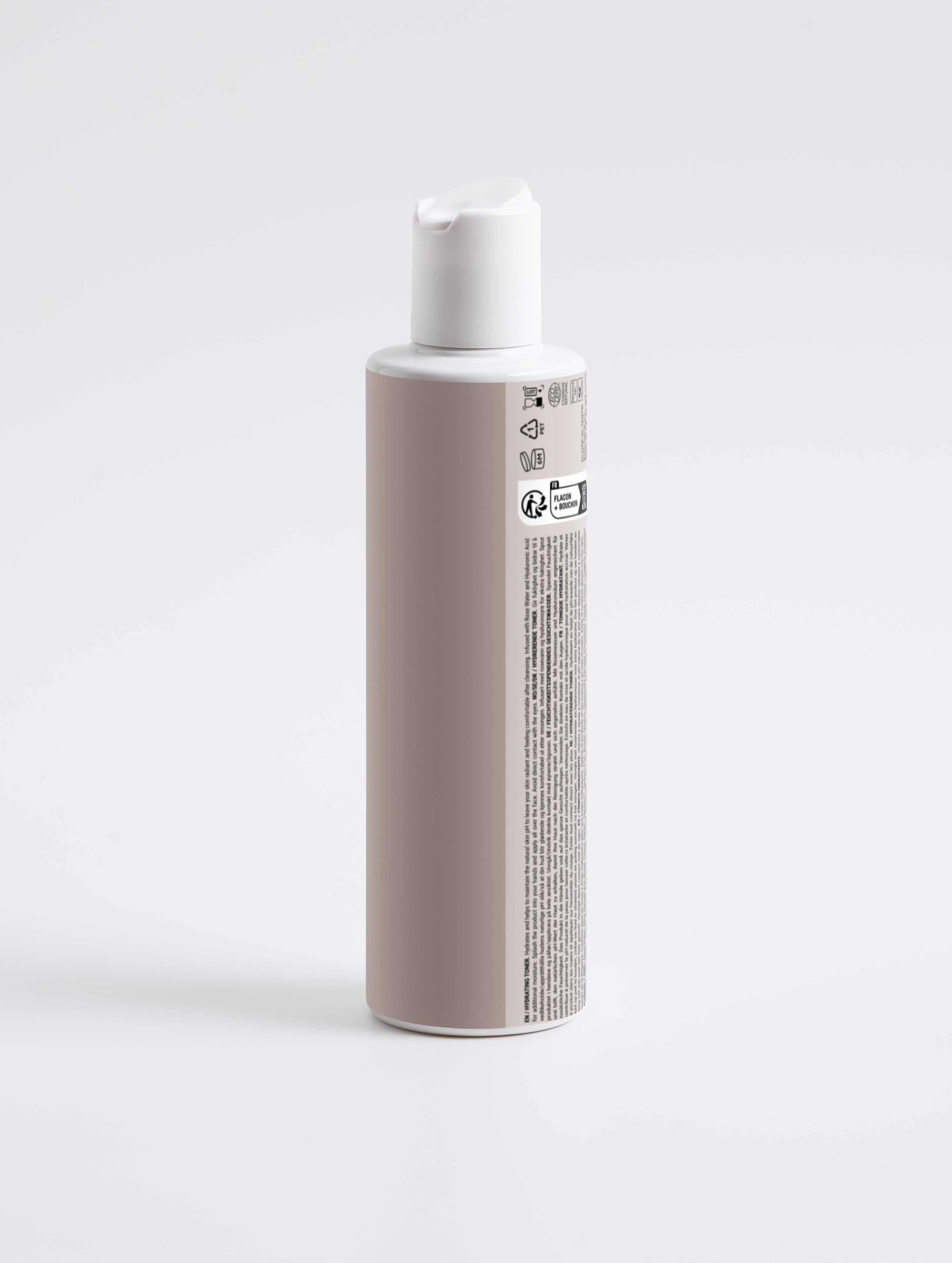 Hydrating toner bottle with rose water and hyaluronic acid for dry and mature skin hydration